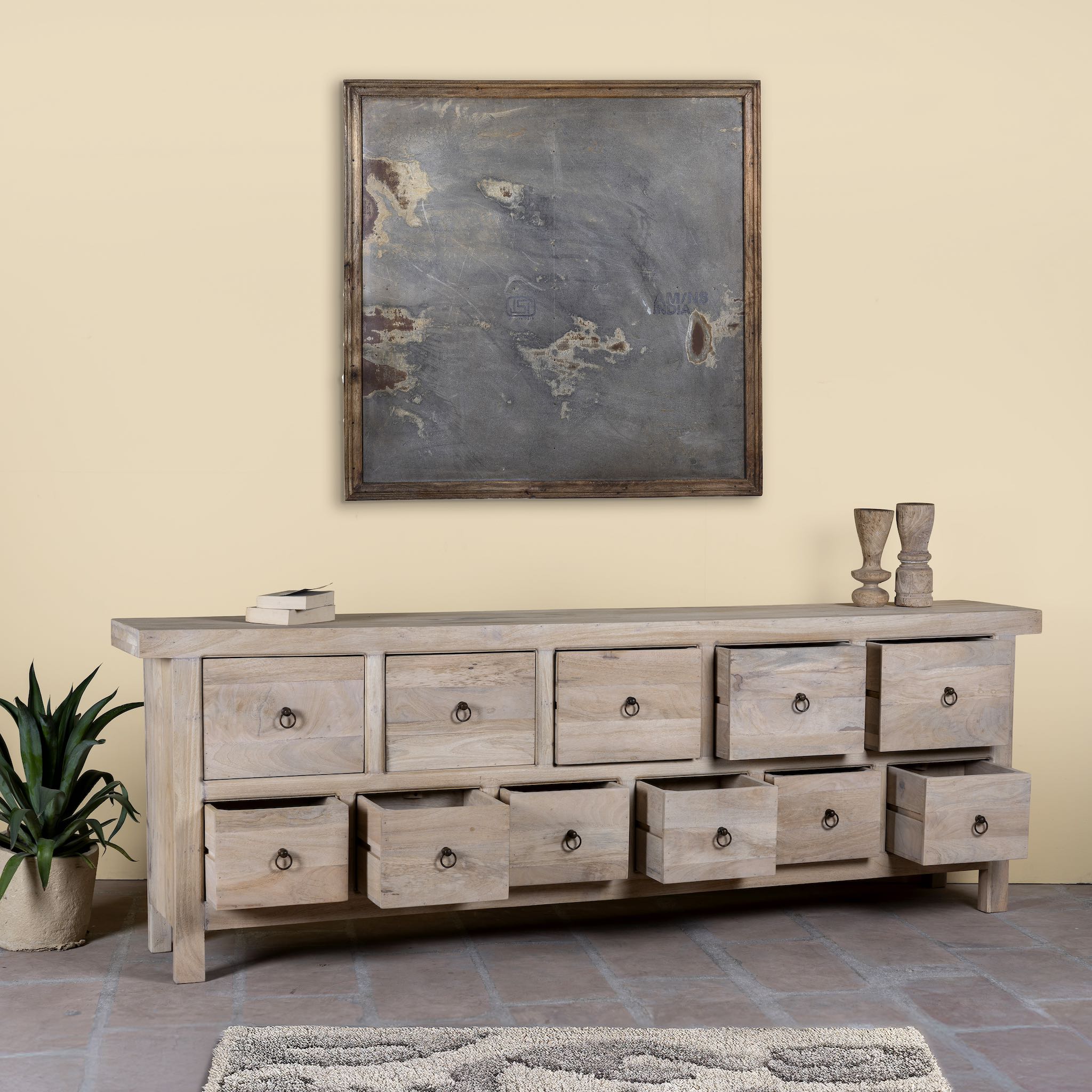 Open drawer image of a reclaimed sandblasted wooden chest of drawers with 11 drawers, part of our Ibiza style furniture collection.