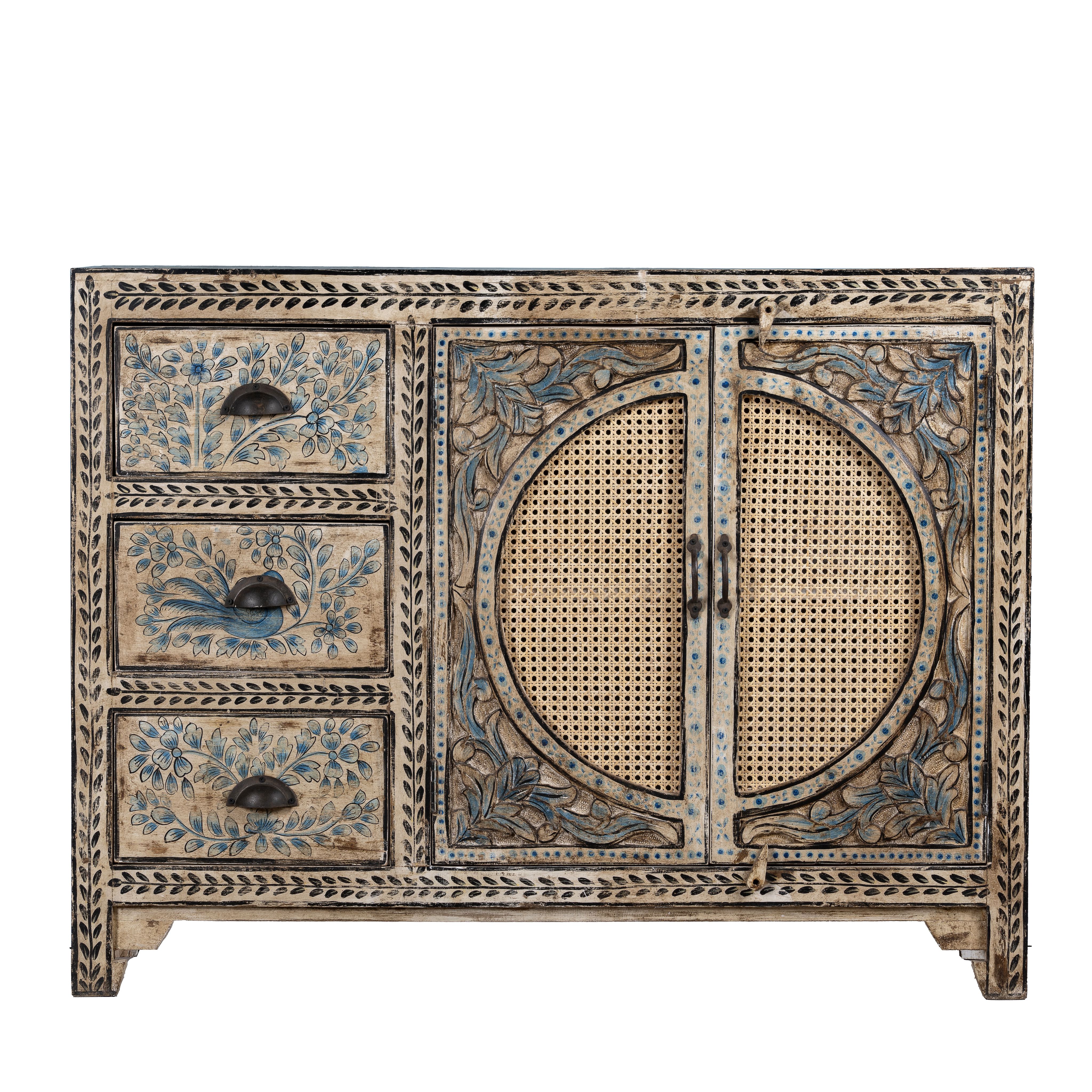 White background image of a hand painted sideboard in blue and beige with rattan door inserts; unique furniture for boho style interiors, 120 × 40 × 92 cm.