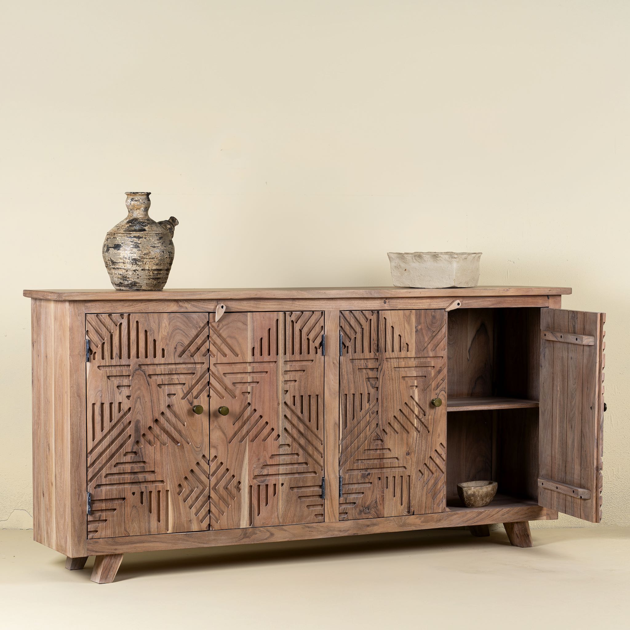 Open door view of a Acacia wood furniture sideboard with hand-carved detailing and brass knobs, modern living room furniture, 180 × 40 × 90 cm.