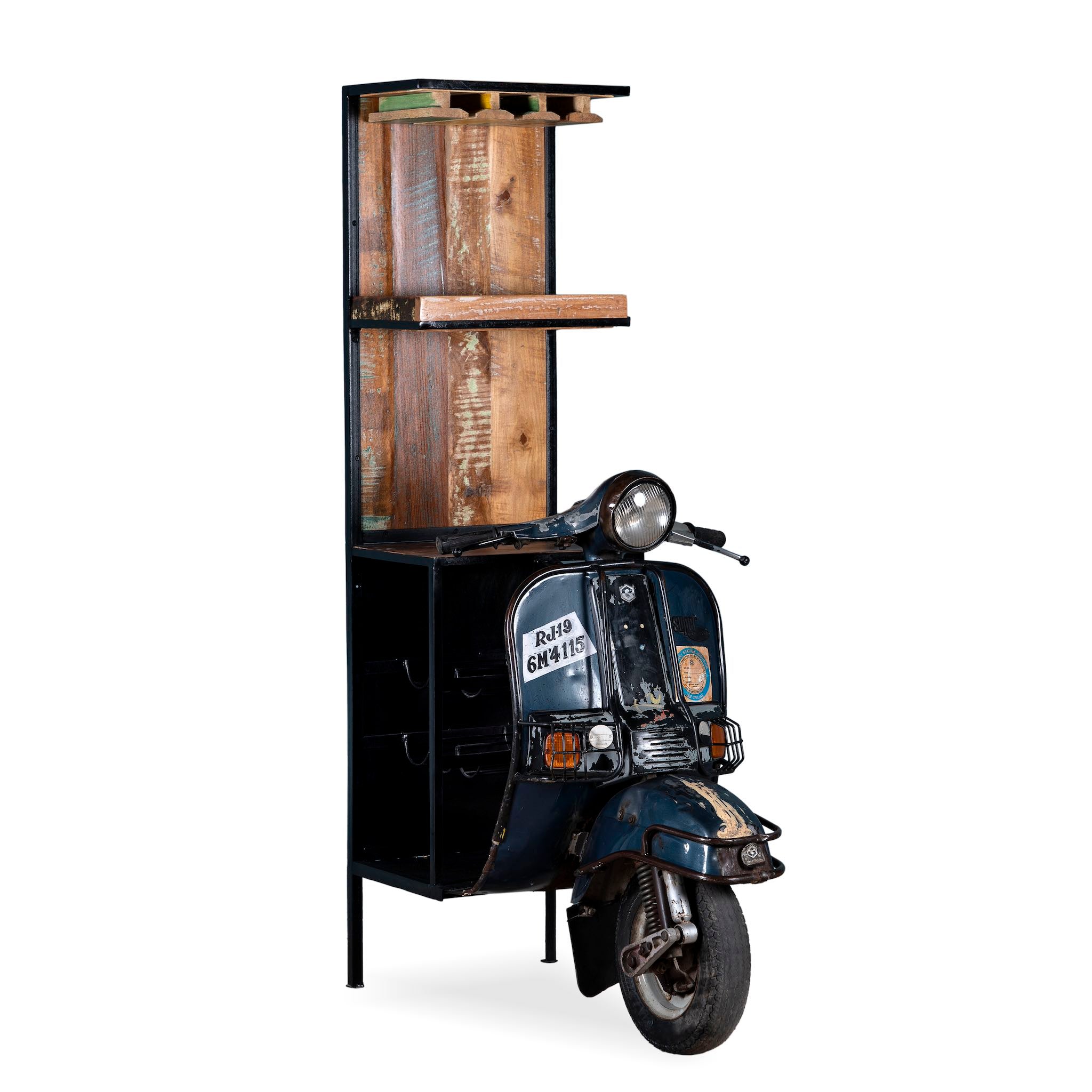 White background image of a high bar table featuring the front half of a vintage Bajaj scooter, with tall wooden shelving and an industrial metal frame, designed for stylish bar storage.