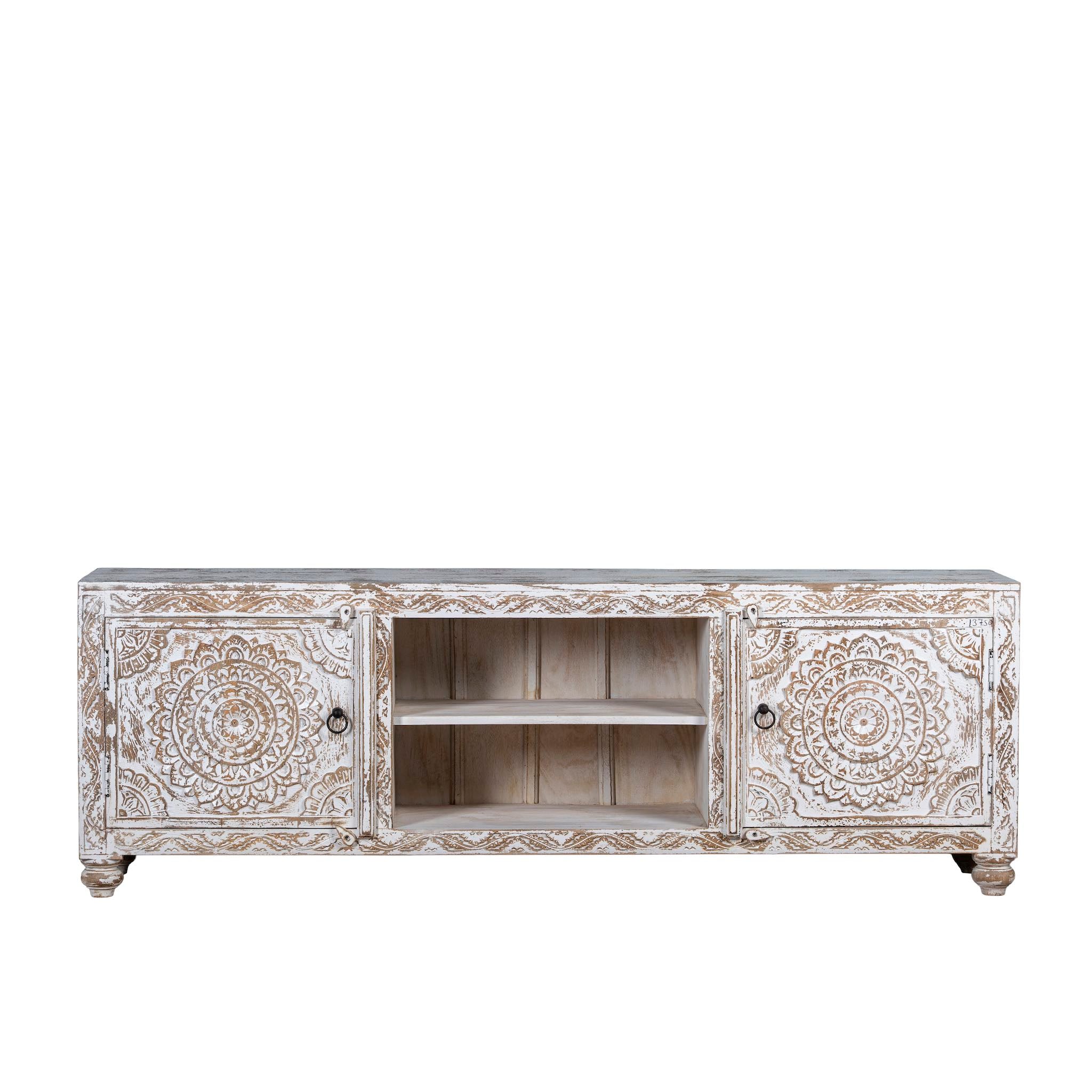 Decorative wooden cabinet with intricate carvings on a white background