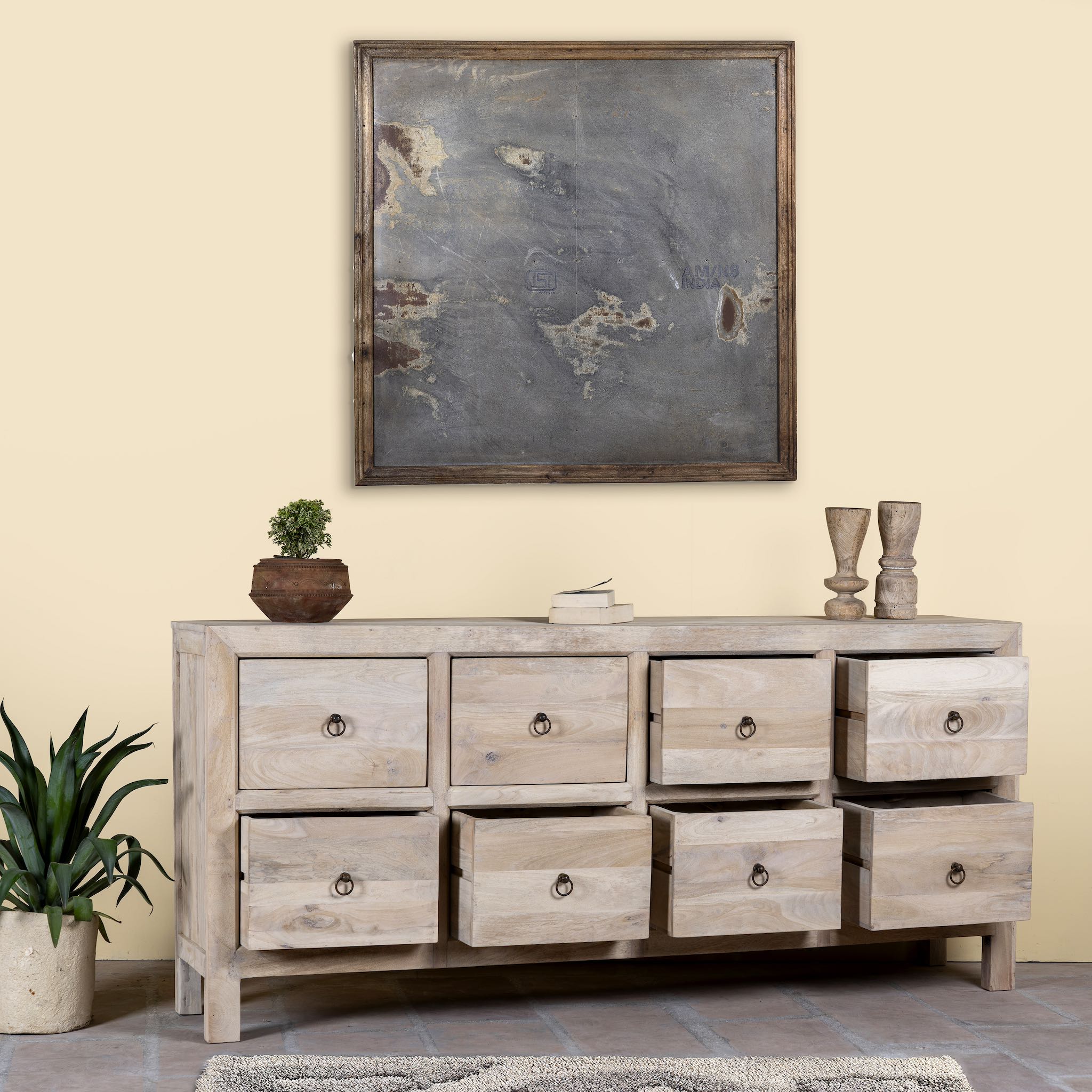 Open drawer image of a Ibiza style chest of drawers made from sandblasted reclaimed wood, coastal furniture with 8 drawers and vintage metal pulls, 200 × 40 × 90 cm.