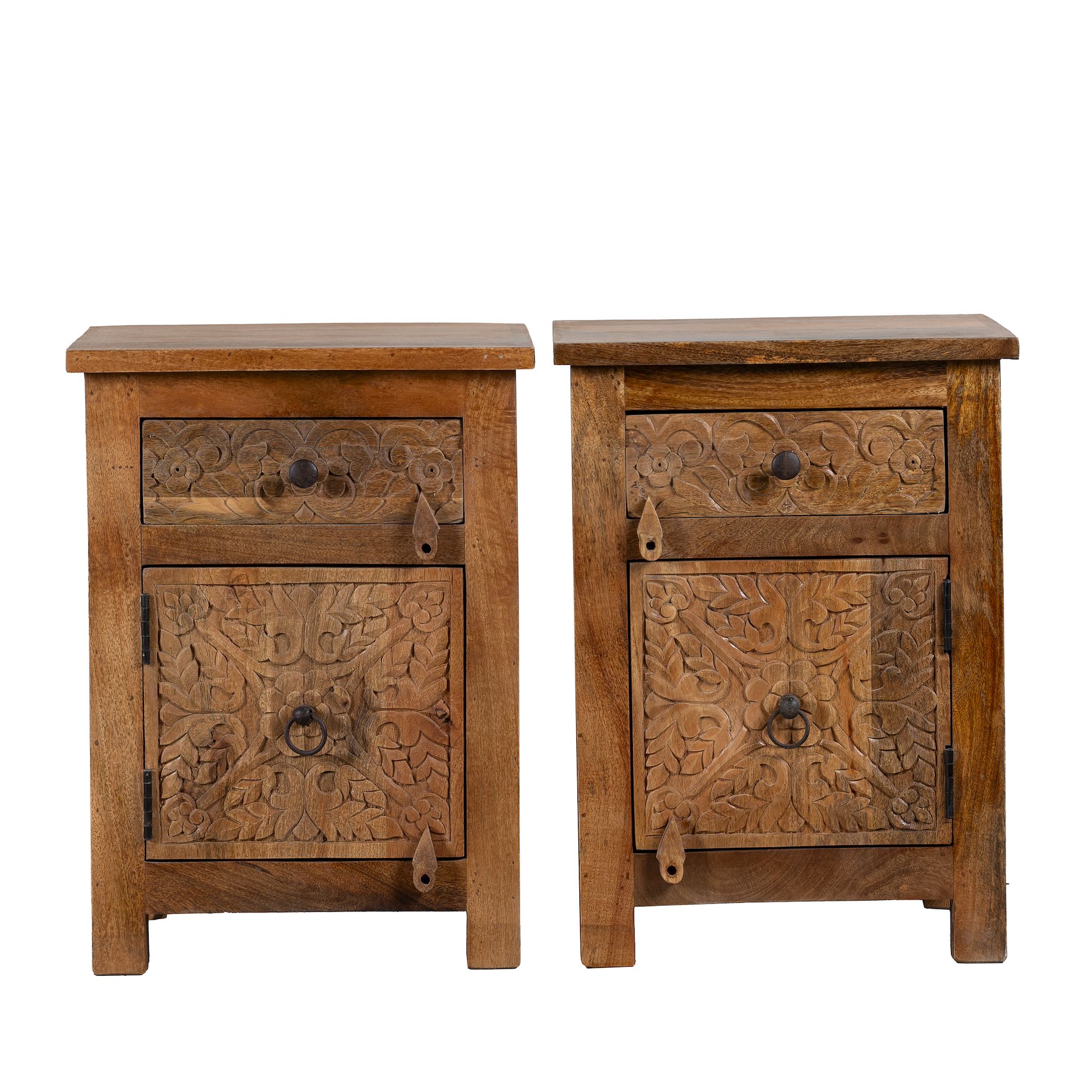 White background image of a hand-carved mango wood bedside tables with floral motifs – a set of carved wooden furniture perfect for rustic and relaxed interiors.