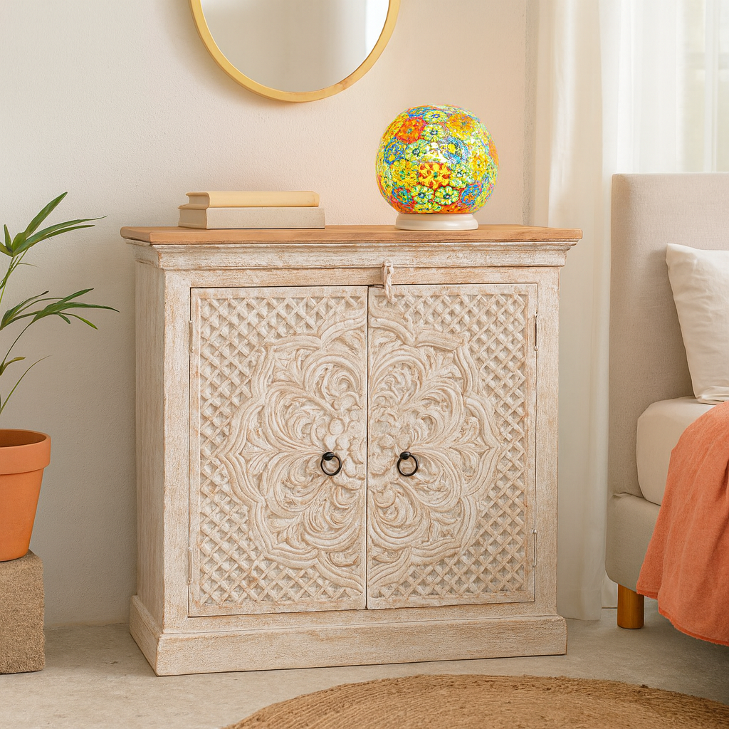 Decorative cabinet with intricate carvings in a living room setting