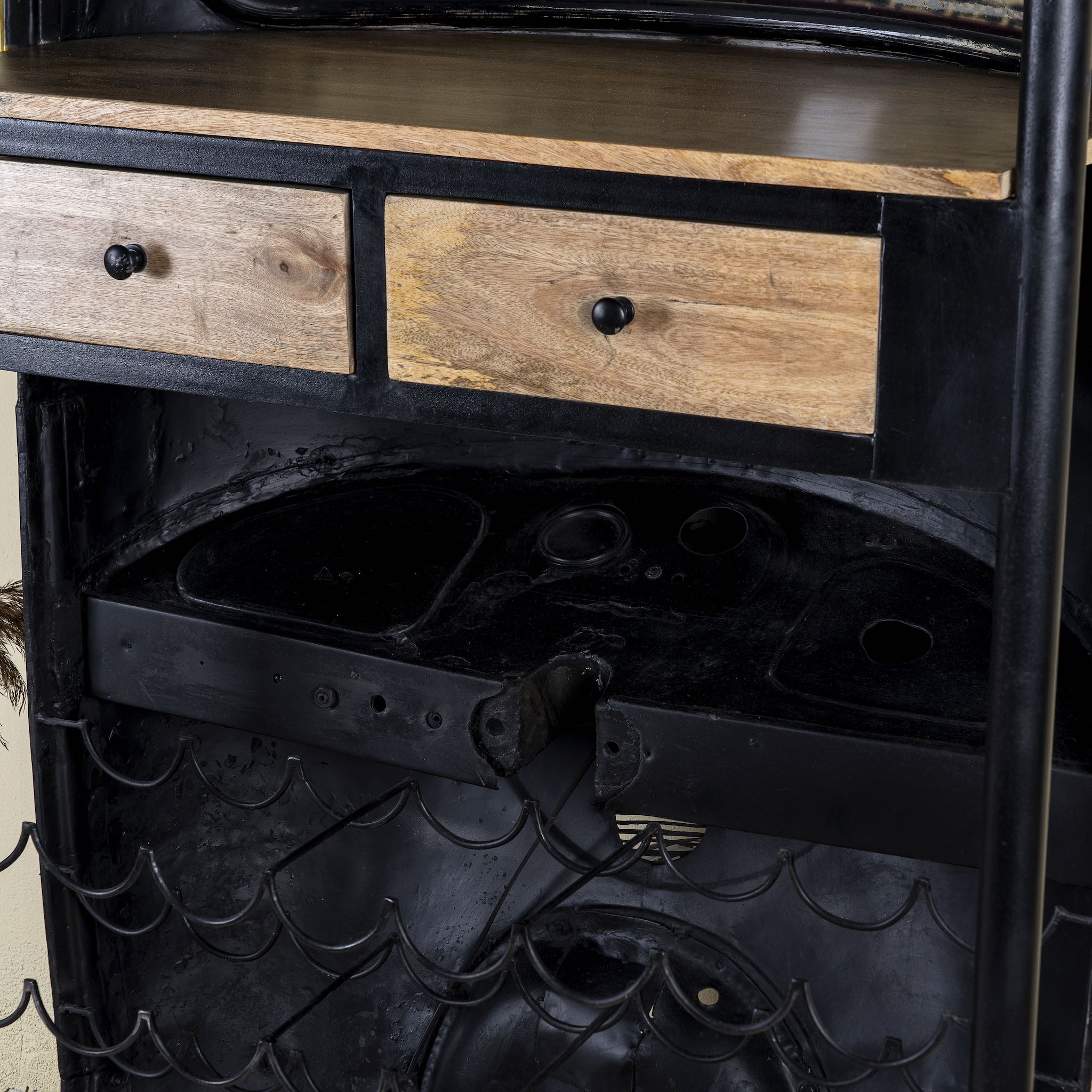 Unique bar table crafted from the front part of an old Indian rickshaw, featuring vibrant yellow and black paint with original details and functioning light.