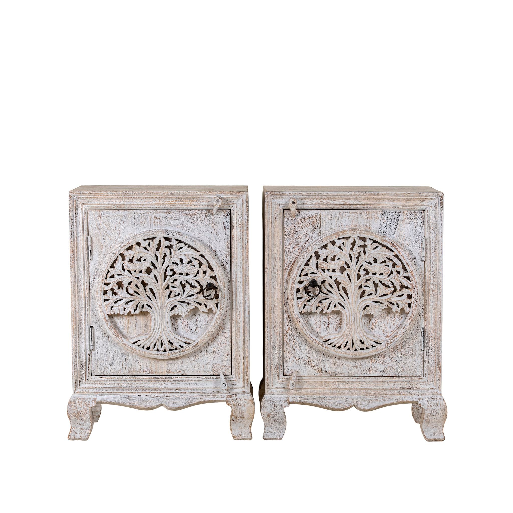 White background image of a pair of mango wood bedside tables with hand-carved tree motifs and antique finish; perfect bedroom furniture and mango wood furniture, 50 × 70 × 40 cm.