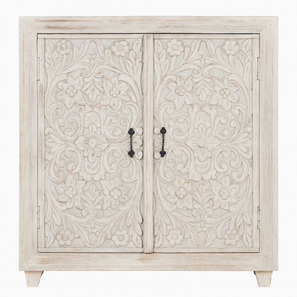 White background image of a white washed wooden cabinet made from mango wood with hand-carved Indian floral patterns, rustic Mediterranean-style furniture, 90 × 97 × 40 cm.