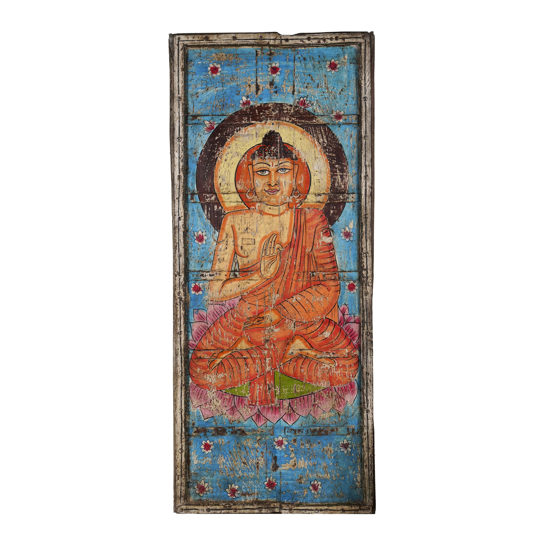 White background image of a hand-painted wall panel made from reclaimed wood, featuring a vibrant depiction of Buddha in a meditative pose on a lotus flower, with a bright blue floral background and a worn, rustic finish that adds vintage charm.