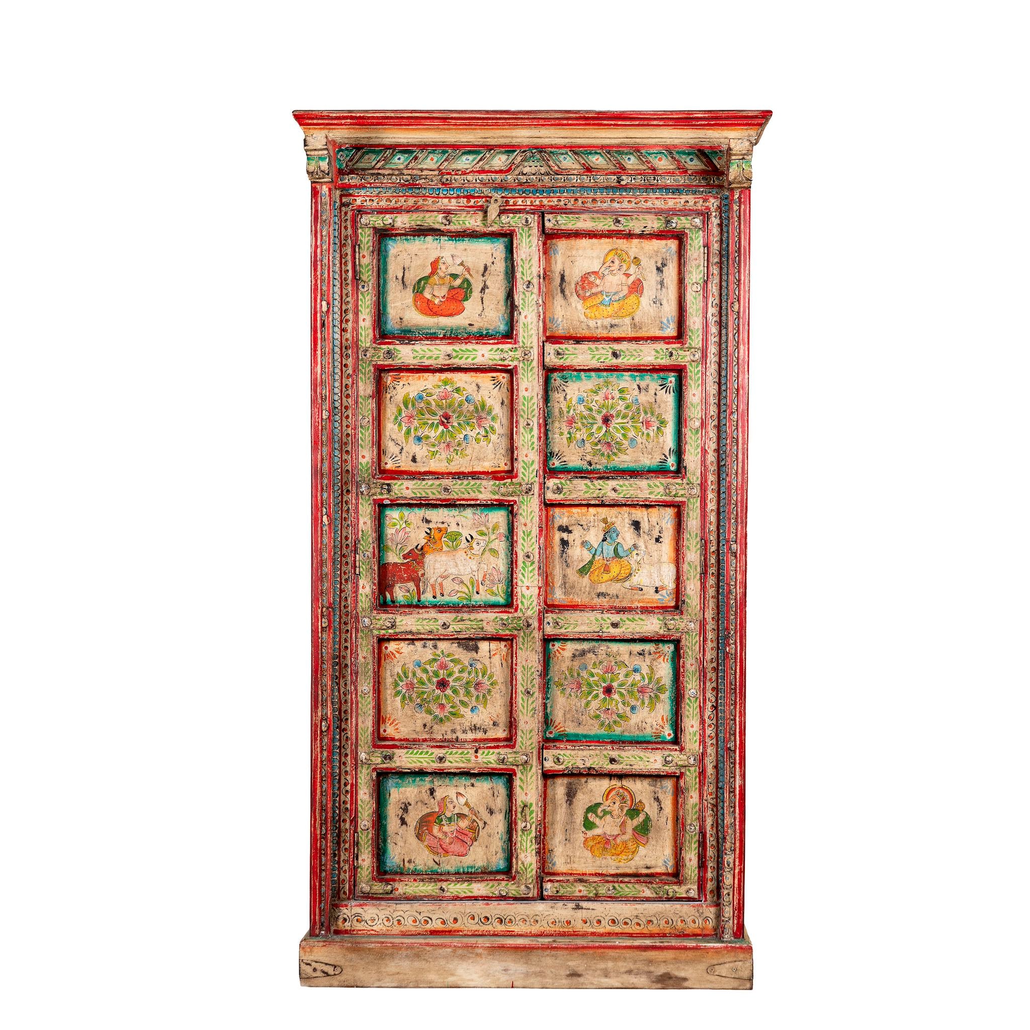 White background image of a antique hand painted wardrobe made from reclaimed teak wood with Indian motifs; unique furniture and teak wood furniture, 113 × 50 × 190 cm.