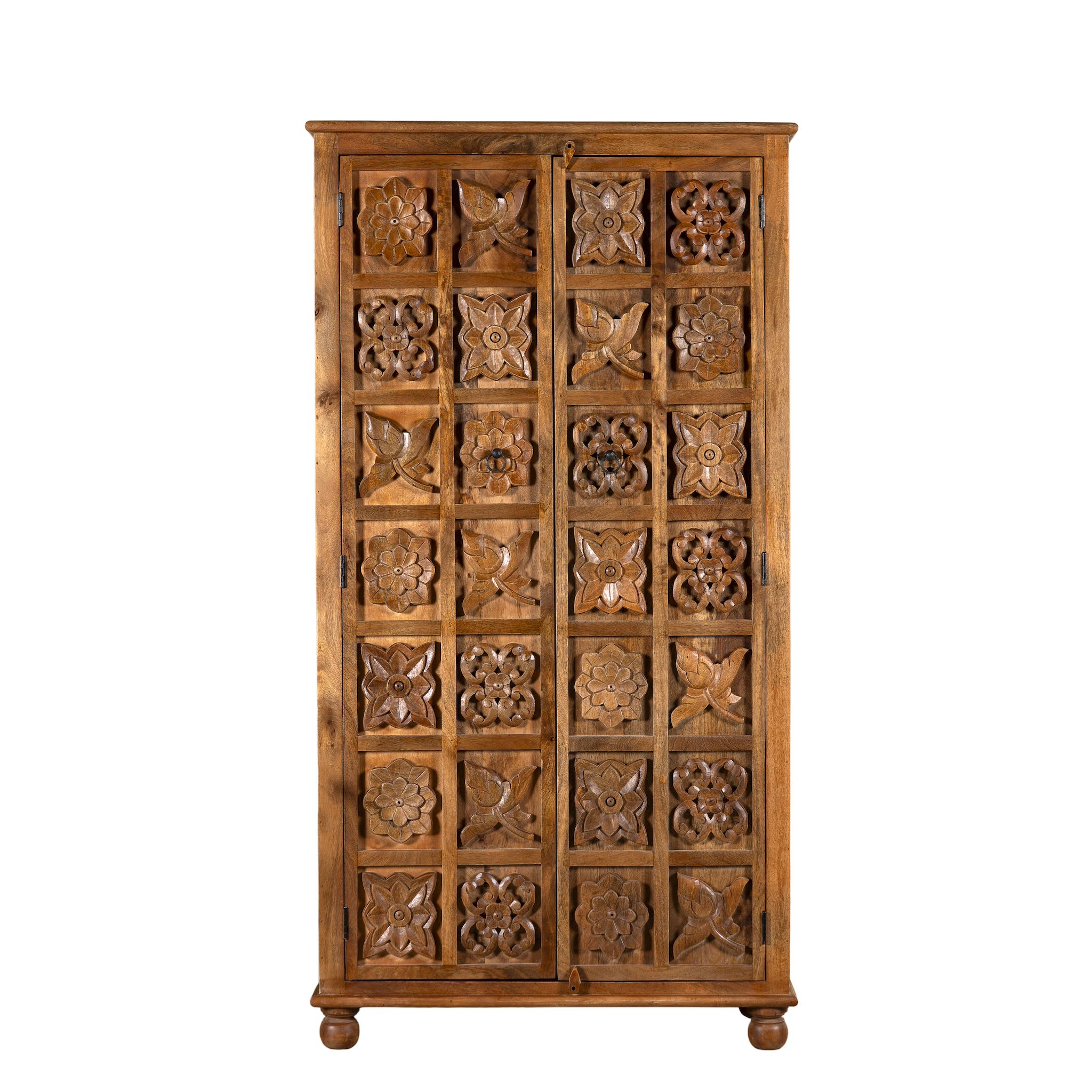 White background image of a hand-carved mango wood wardrobe with floral motifs; wooden wardrobe in natural finish, 100 × 45 × 190 cm.