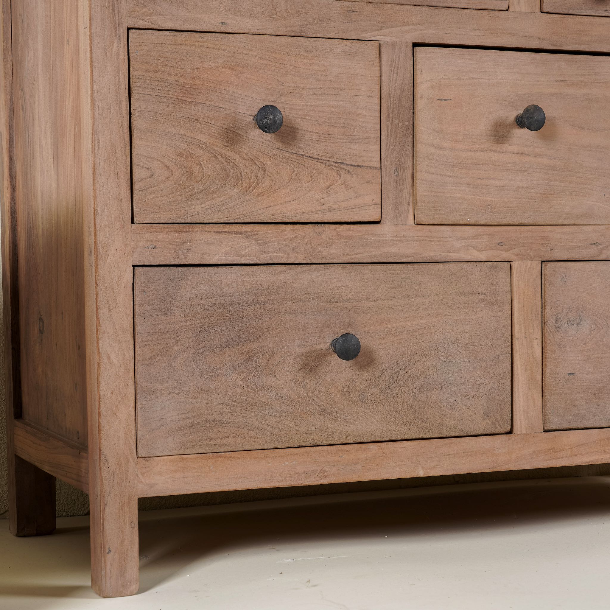 Close up image of a teak furniture chest of drawers made from reclaimed old teak wood, eco-friendly sustainable furniture in Ibiza style, 100 × 40 × 100 cm.