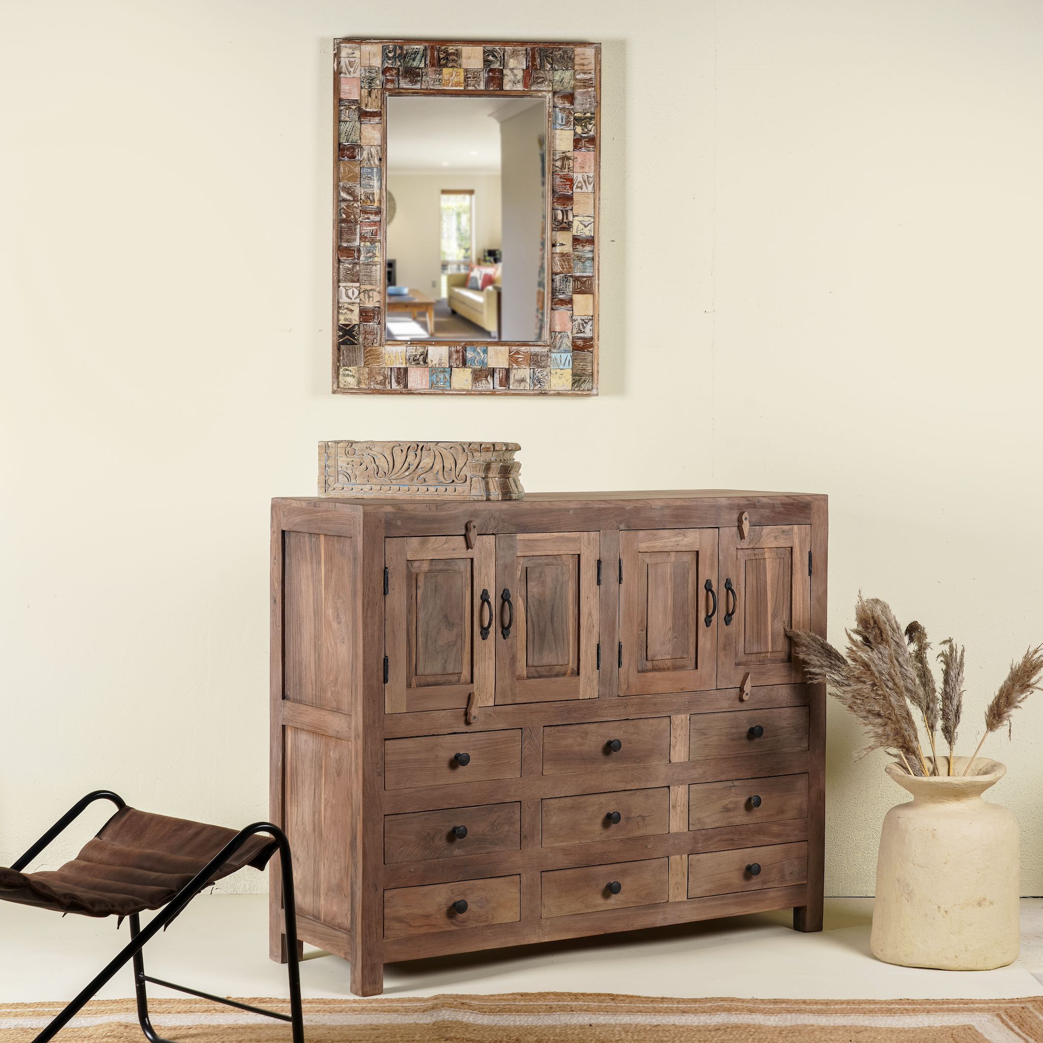 Side angle image of a sustainable furniture teak sideboard made from reclaimed old teak wood in Ibiza style, 120 × 40 × 100 cm.