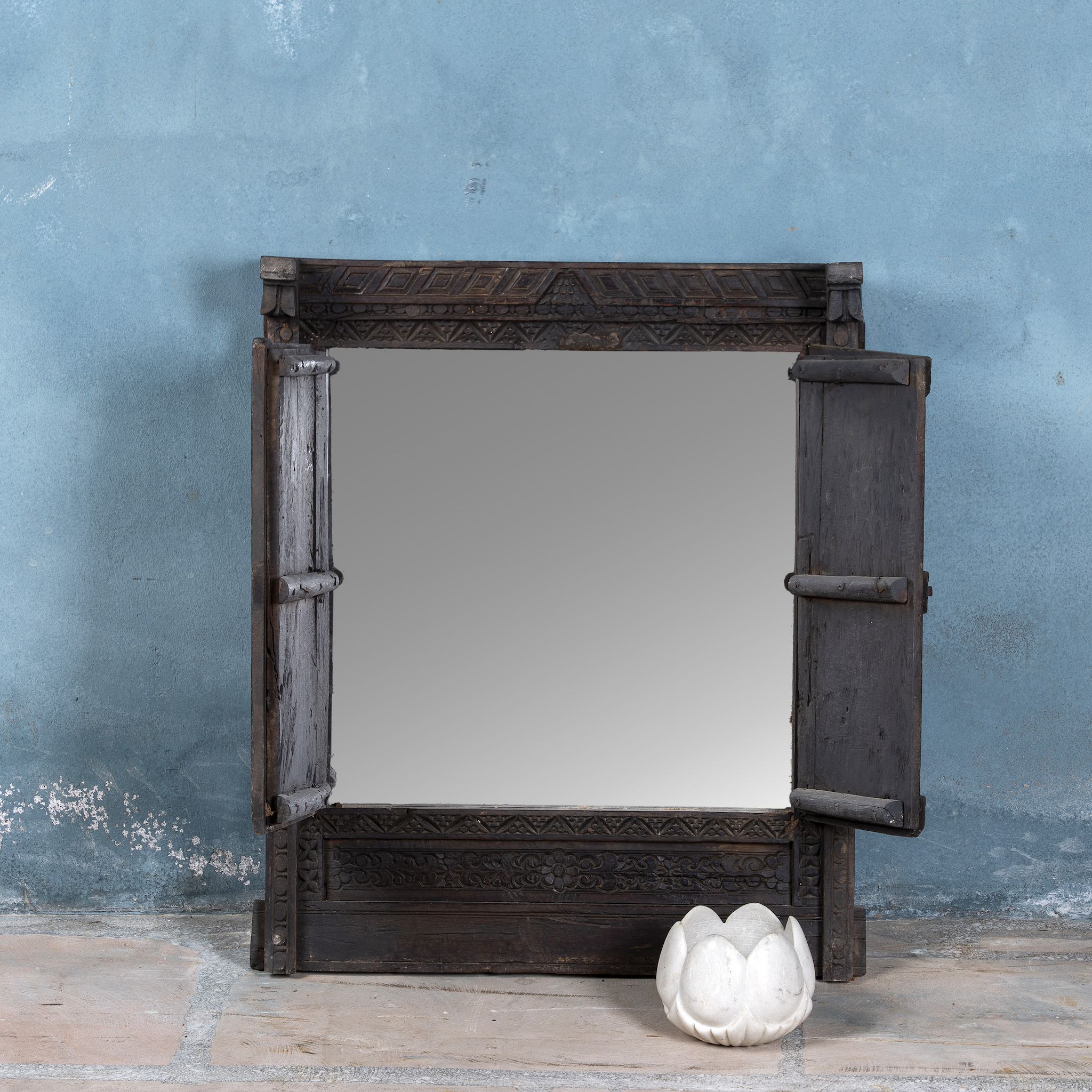 Image with open shutters of an antique teak window mirror with shutters, vintage wall panel design, part of our vintage home accessories collection.