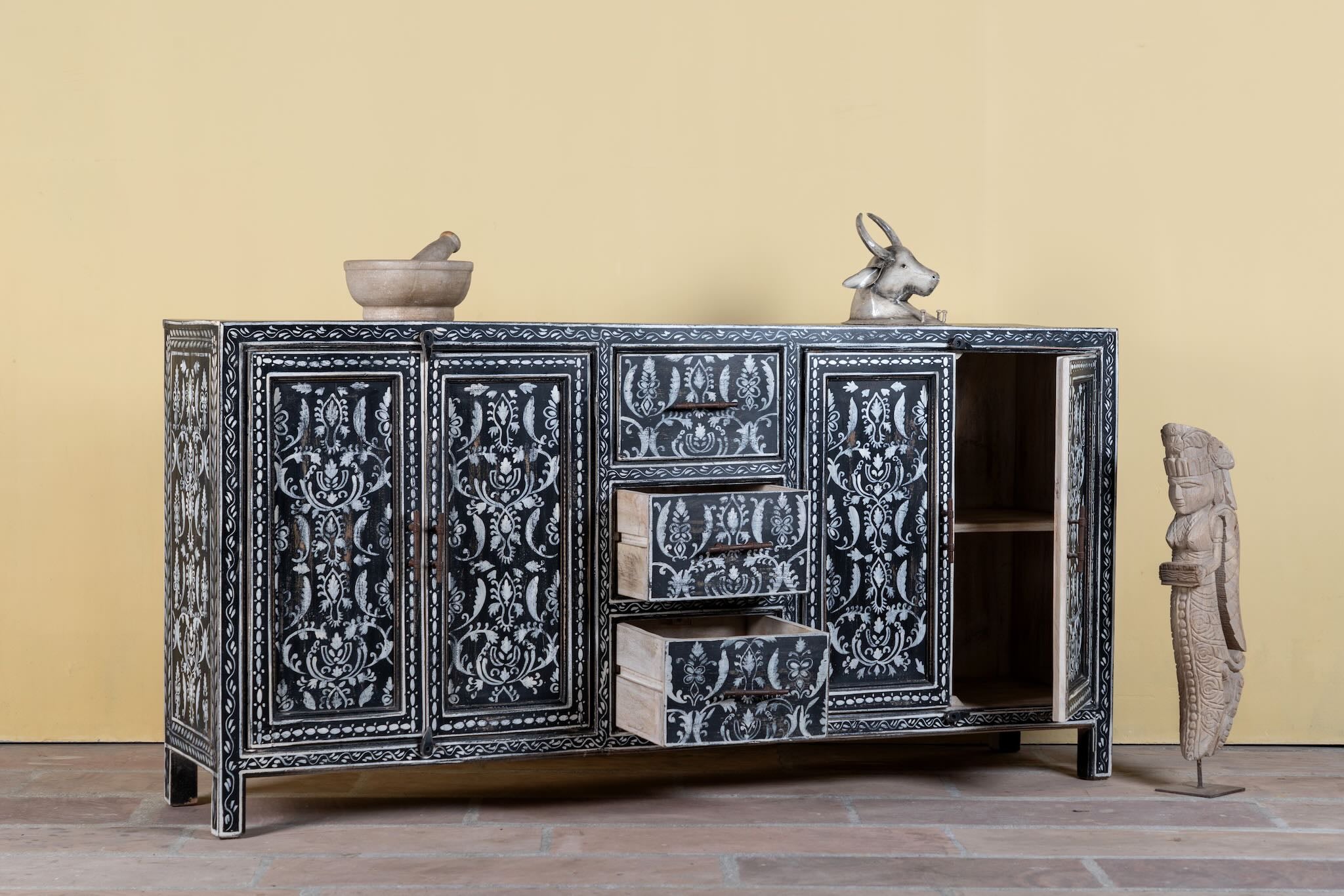 Side angle image with open doors of a Hand-painted black and white sideboard made of reclaimed wood – Kaira model by Om Home & Garden