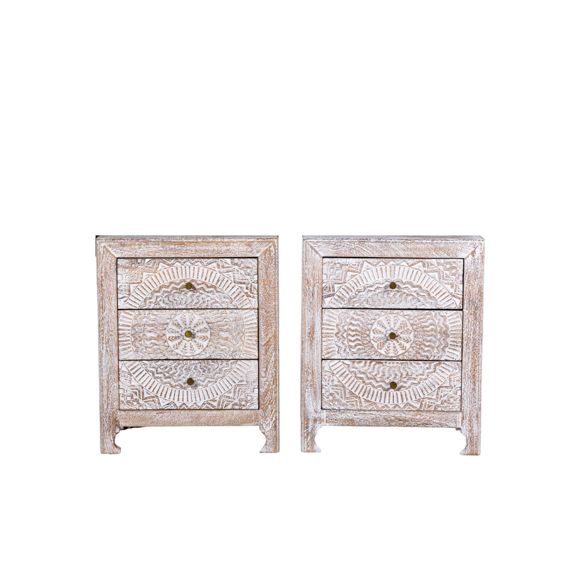 White background image of a set of two hand carved night stands in solid mango wood with mandala motifs; white washed furniture, 50 × 40 × 60 cm.