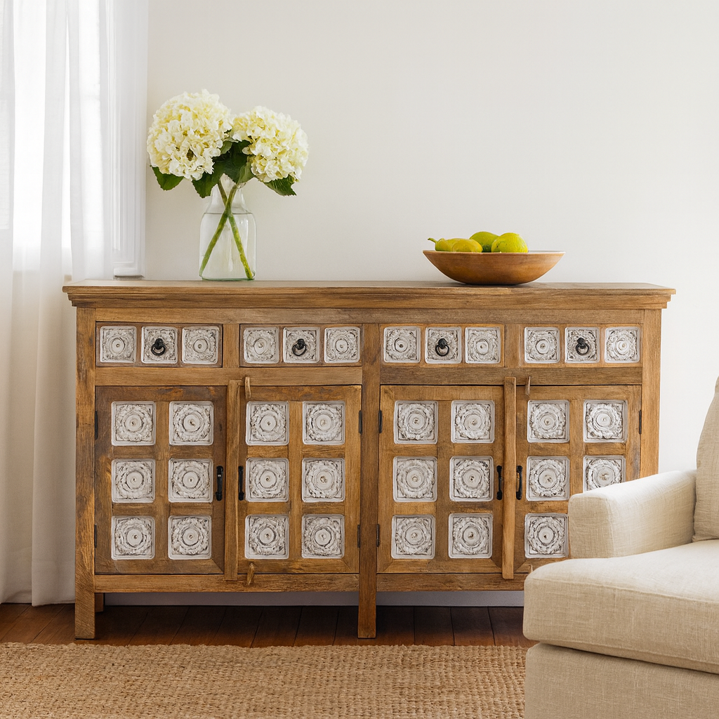 Lifestyle imagination of a hand-carved mango wood sideboard with whitewashed floral details; perfect as living room furniture or mango wood furniture for vintage interiors, 180 × 100 × 40 cm.