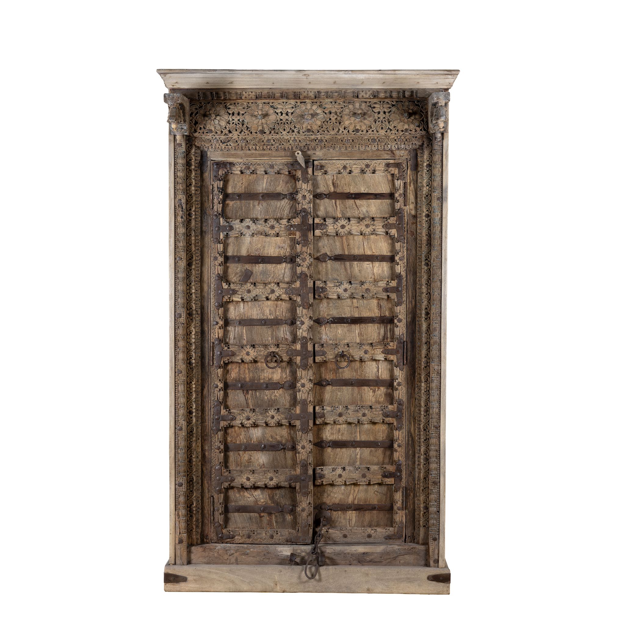 White background image of a cabinet with antique carved teak door, part of our teak wood furniture collection, perfect for a bohemian interior.