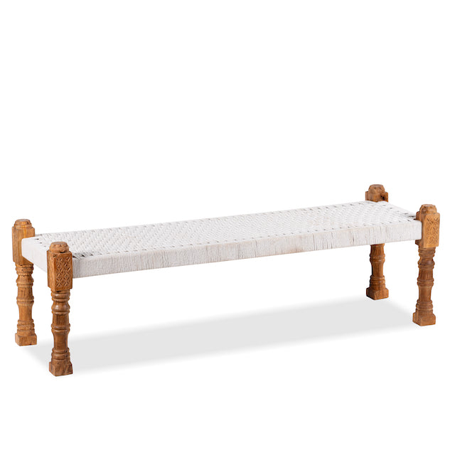 White background image of a low mango wood bench with handwoven cotton seat and recycled wood frame; Indian daybed-style, 120 × 45 × 20 cm.