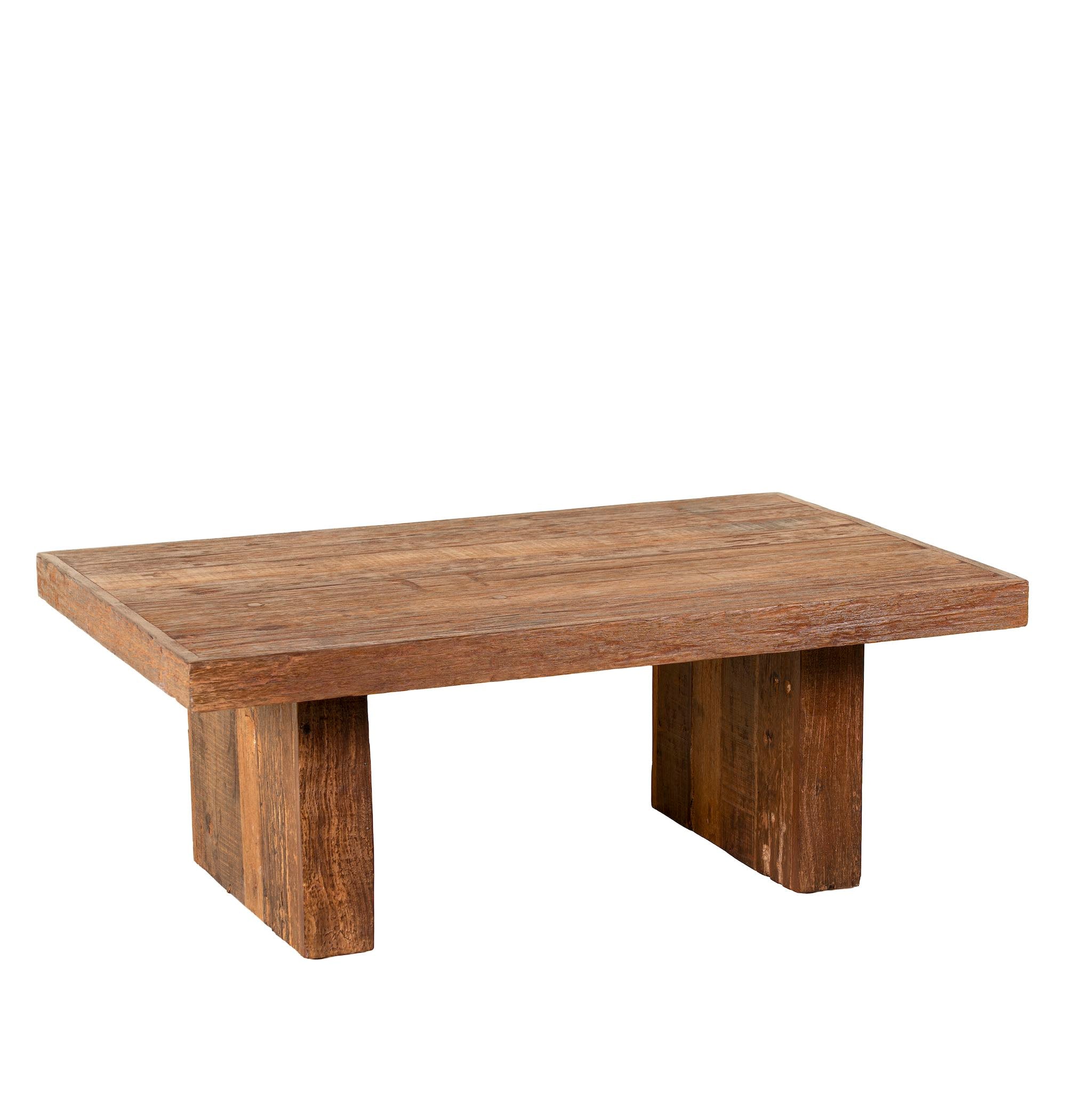 White background image of a rectangular reclaimed wood coffee table with block legs; sustainable furniture for rustic and modern interiors, 120 × 80 × 46 cm.