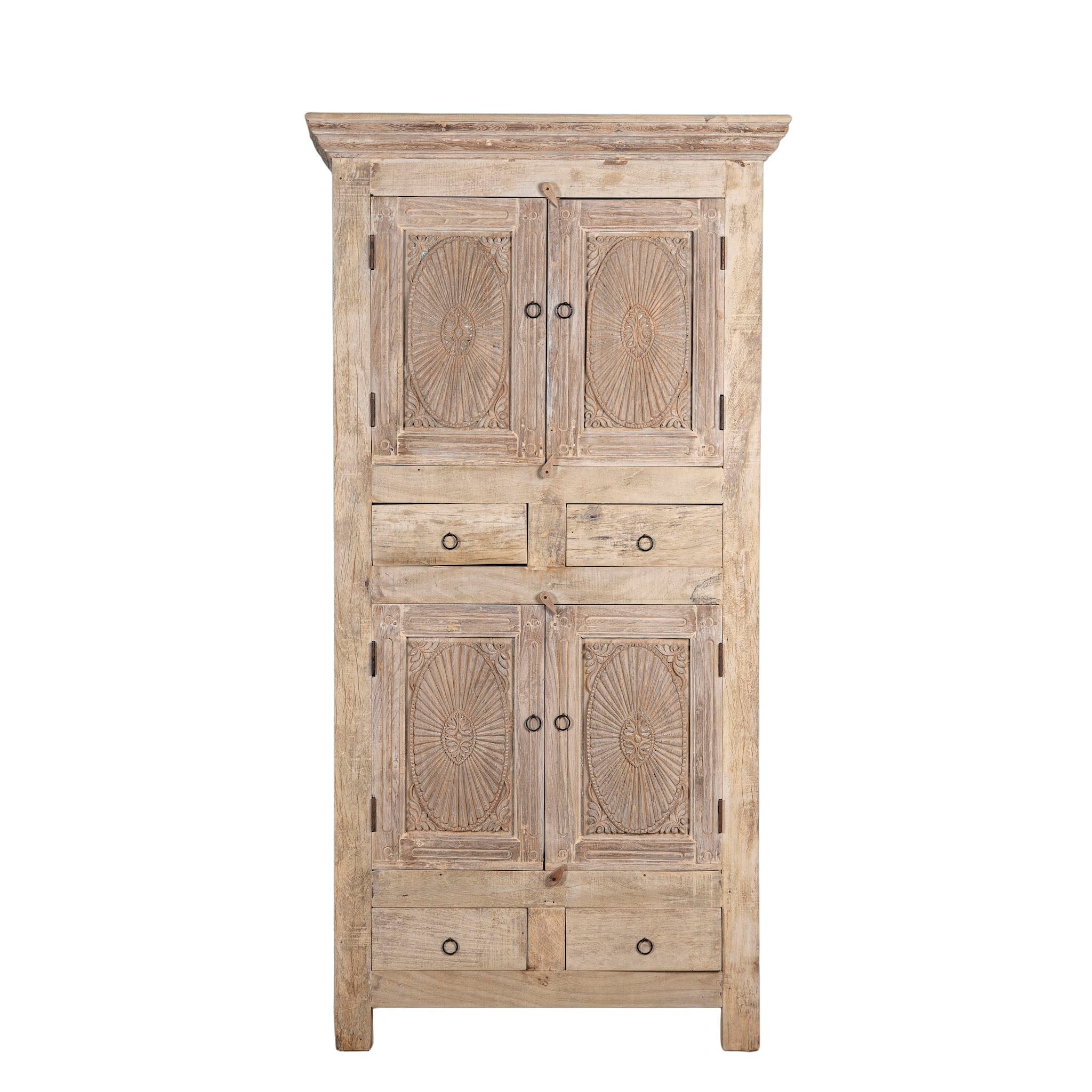 White background image of a handcrafted wooden carved wardrobe with antique panel doors – teak wood furniture with rustic charm and traditional detailing.