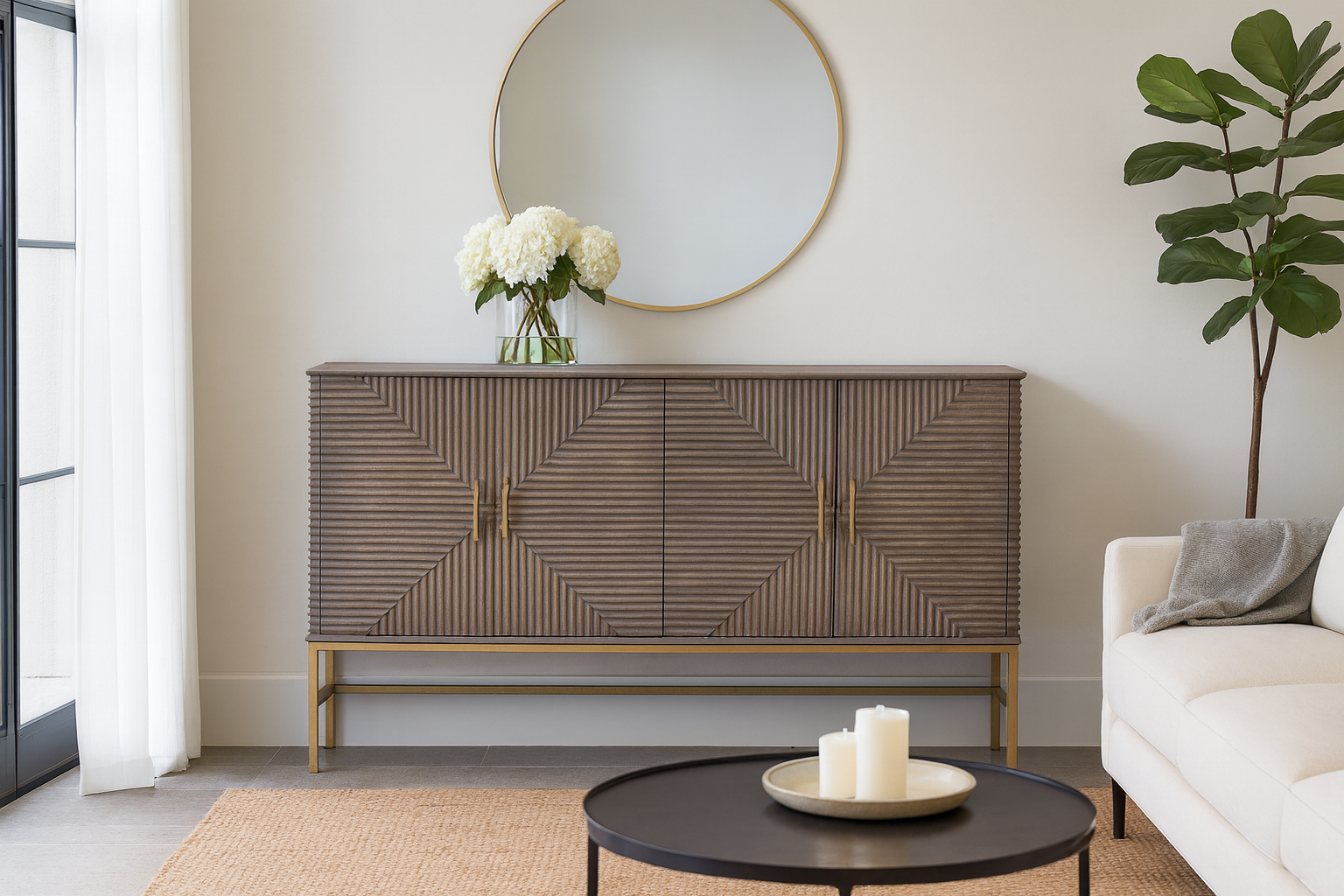 Modern living room with a decorative cabinet, round mirror, and white flowers.