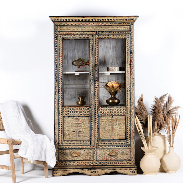 Hand-painted display cabinet made from recycled wood with glass doors – sustainable furniture featuring Sanskrit motifs and traditional Indian craftsmanship.