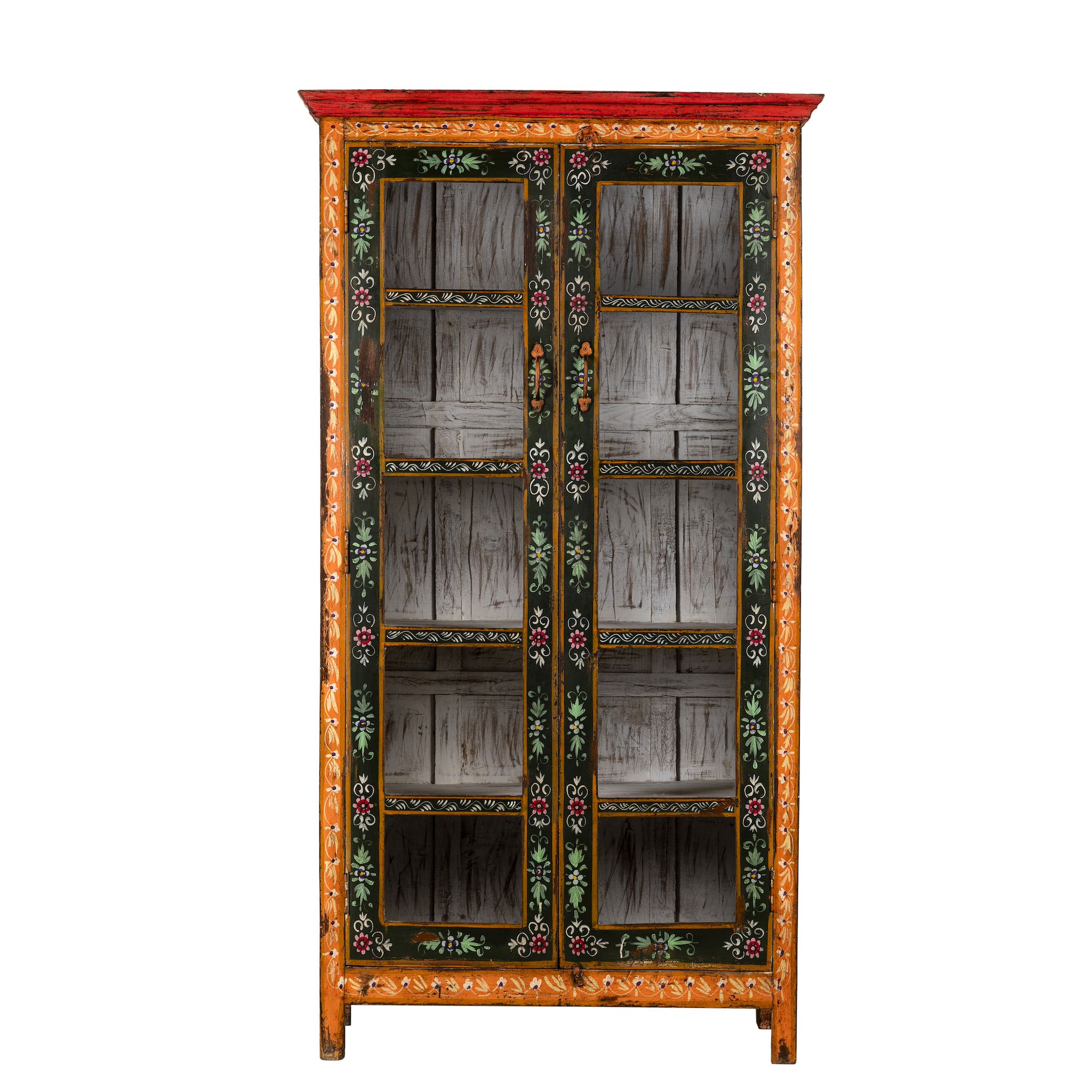 White background image of a hand-painted reclaimed wood showcase with floral motifs and glass doors – sustainable furniture combining vintage charm and traditional craftsmanship.
