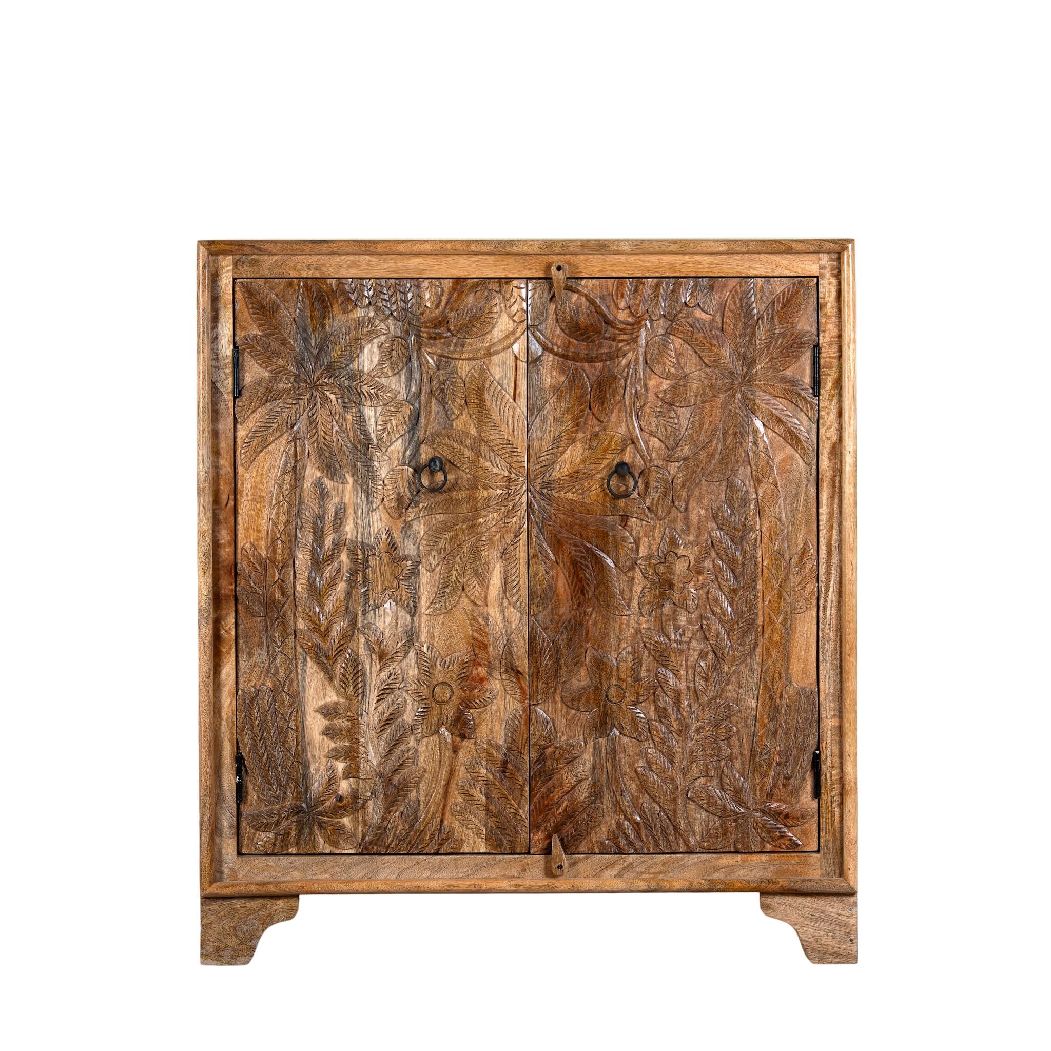 White background image of a hand-carved mango wood cupboard Vansh with double doors featuring intricate floral and botanical motifs. A Mediterranean-inspired piece of Indian furniture offering functional storage and timeless artisan detail.
