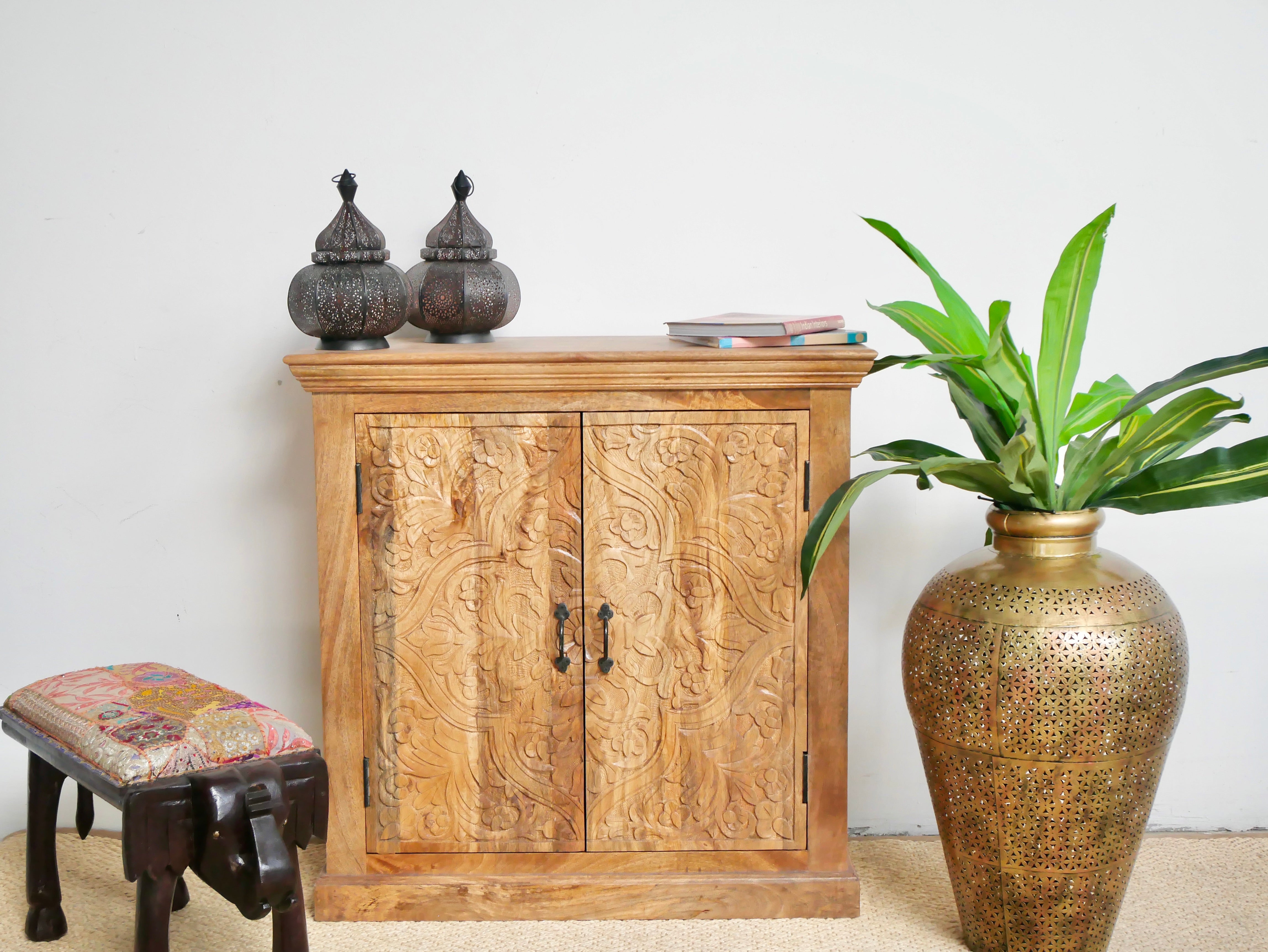 Carved wood furniture cabinet made from solid mango wood, hand-carved floral design, Mediterranean-style, 90 × 97 × 40 cm.