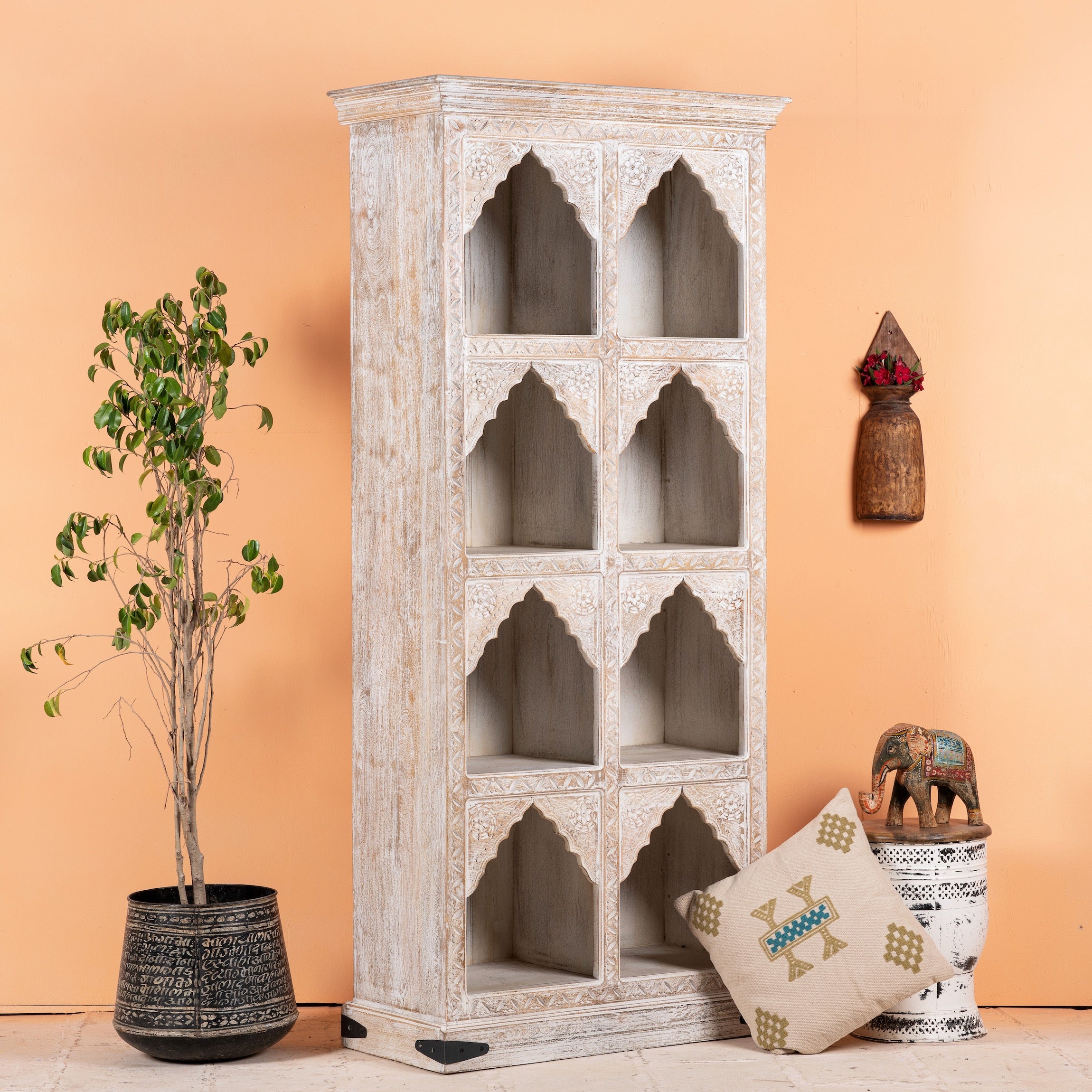 Hand-carved mango wood shelving unit with Moroccan arches and whitewashed finish; perfect as an entryway shelf or display piece, 180 × 90 × 40 cm.
