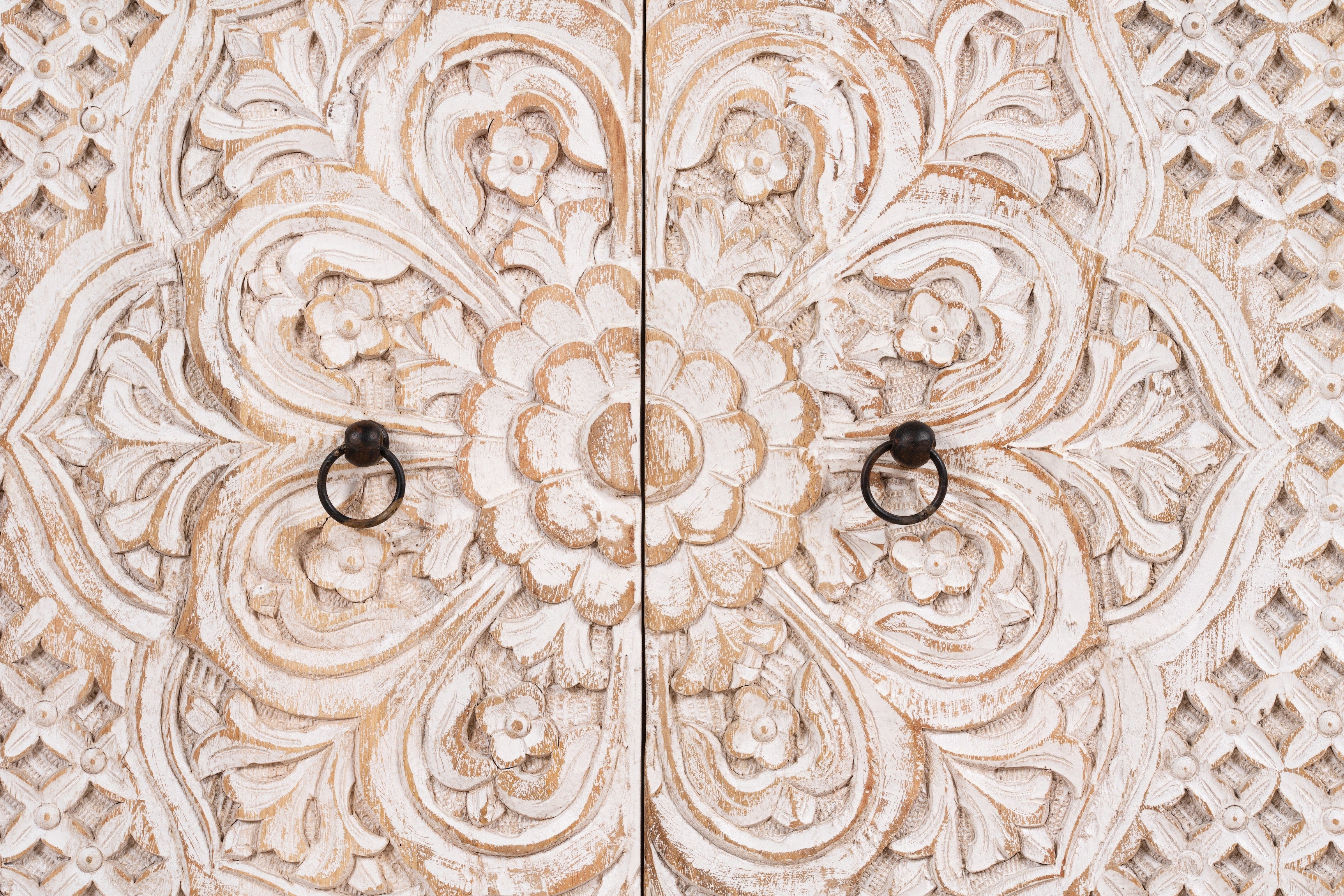 Close up image of a whitewashed mango wood sideboard with hand-carved floral patterns; compact carved sideboard for vintage interiors, 90 × 90 × 40 cm.