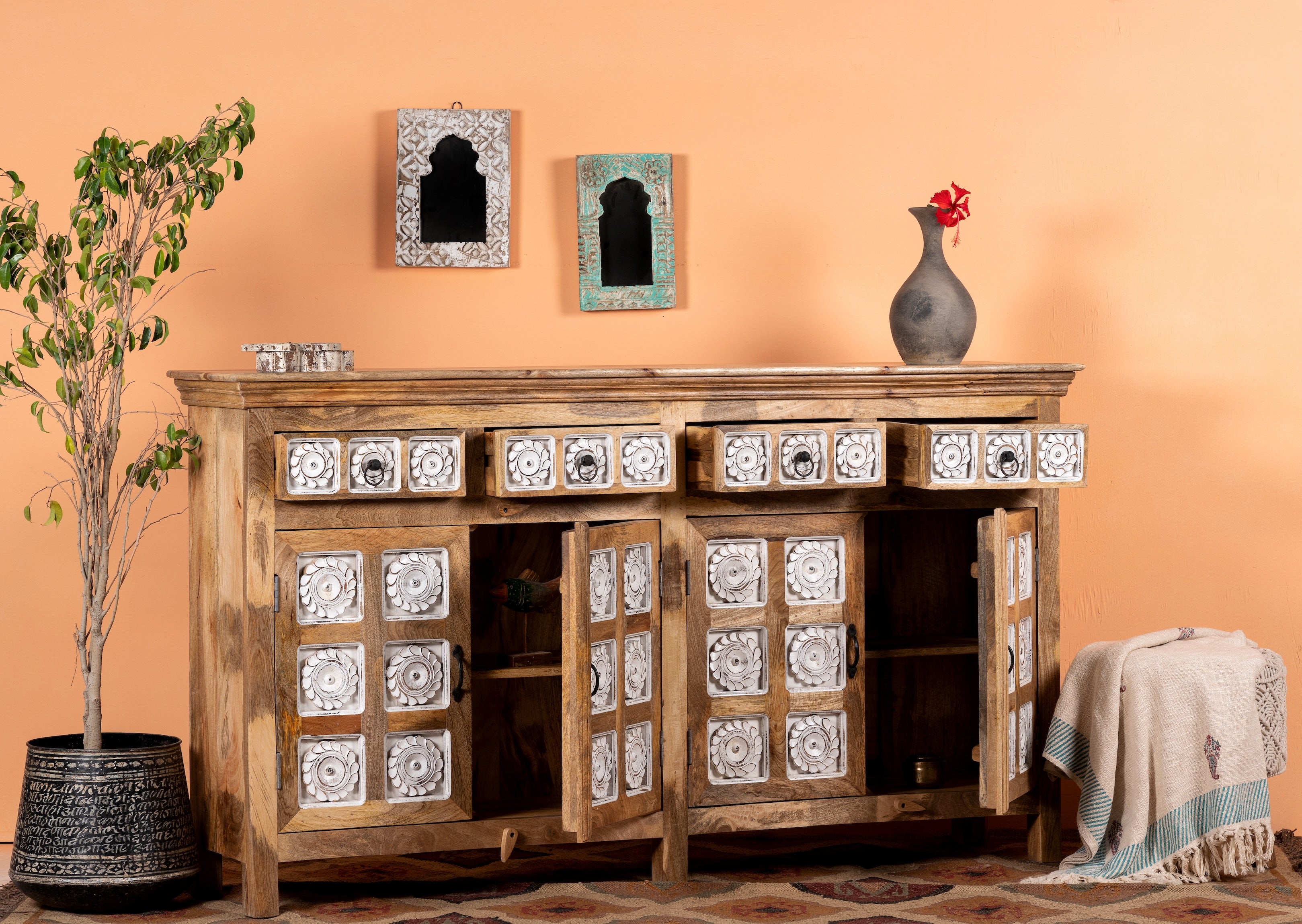 Open door image of a hand-carved mango wood sideboard with whitewashed floral details; perfect as living room furniture or mango wood furniture for vintage interiors, 180 × 100 × 40 cm.