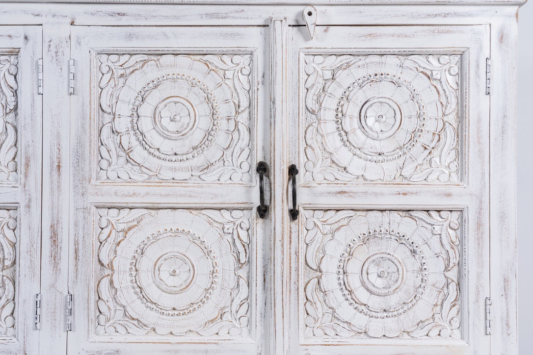 Close up image of a Mango wood sideboard with hand-carved floral mandala doors; ideal for vintage home decor and mango wood furniture, 180 × 90 × 40 cm.