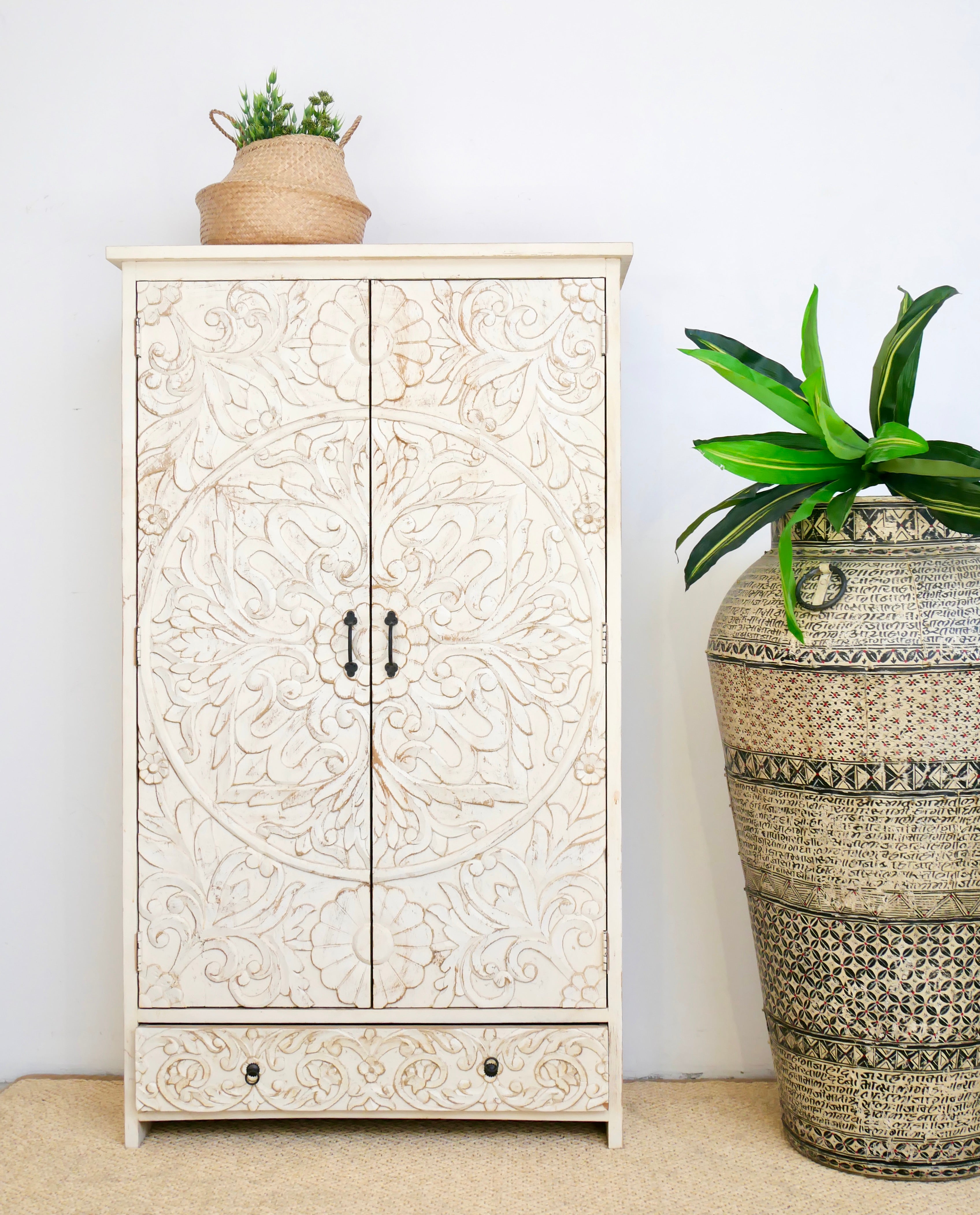 Hand-painted iron floor vase with Sanskrit motifs – a one-of-a-kind painted iron decoration perfect for bohemian interior styling.