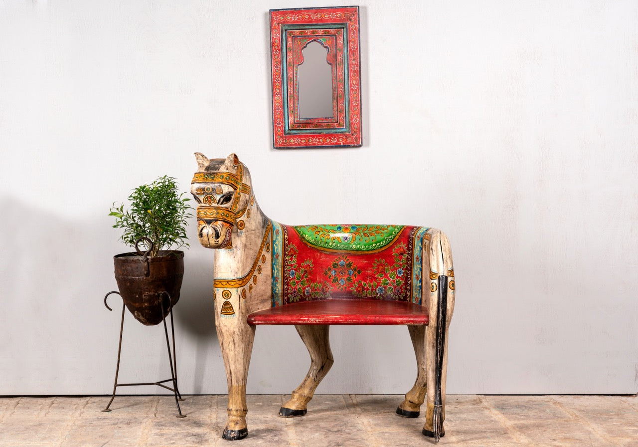 Hand‑painted Horse Chair made from recycled teak wood with carved horse design and vibrant Indian folk art detailing, showcasing artistic and sustainable Indian furniture.