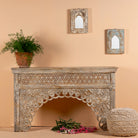 Vintage console table in mango wood with hand-carved floral and geometric patterns and arched detailing; carved console table, 150 × 90 × 40 cm.