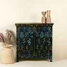 Hand painted cupboard made from recycled wood with floral motifs, two drawers and two doors, 90 × 90 × 40 cm.