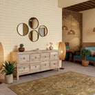 Lifestyle imagination of a reclaimed sandblasted wooden chest of drawers with 8 drawers, part of our Ibiza style furniture collection.