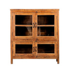 White background image of a reclaimed teak wood display cabinet with four glass-panelled doors – wooden showcase cabinet crafted as sustainable furniture with timeless appeal.
