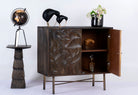 Side angle image with open doors of a hand-carved mango wood sideboard with brass-plated iron stand—an artisanal, minimalistic furniture piece combining natural warmth and modern elegance.