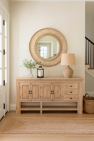 Lifestyle imagination of a sandblasted mango wood console table with 4 doors and 3 drawers; Mediterranean-style vintage entryway table, water-protected surface, 200 × 42 × 100 cm.