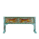 White background image of a hand-painted reclaimed wood console table Bunsee with tiger and leopard motifs in turquoise vintage finish. A unique piece of furniture for bohemian interiors and artistic spaces.