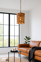 Lifestyle image of a wooden vintage ceiling lamp made from natural mango wood with brass-clad edges and grid design – a refined piece of mango wood lighting for kitchens, dining areas, or entryways.