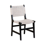 White background image of a Dhanya black Acacia wood chair with hand-woven cotton rope seat and backrest—an elegant piece of wooden seating and part of our artisan akacia wood chairs collection.