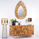 Side angle image of a handcrafted mango wood sideboard with hexagonal inlay design and brass-finished legs—artisanal bedroom furniture combining craftsmanship and modern elegance.