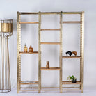 Modular brass-plated iron shelf with removable mango wood trays – minimalistic furniture and mango wood shelving for modern, practical interiors.