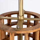 Close up image of a wooden vintage ceiling lamp made of natural mango wood with brass-clad edges and a grid design – elegant mango wood lighting for kitchens, dining rooms, or living spaces.