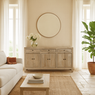 Lifestyle imagination of a sandblasted mango wood sideboard with 3 drawers and 4 cabinet doors; Mediterranean-inspired mango wood furniture, 180 × 40 × 90 cm.