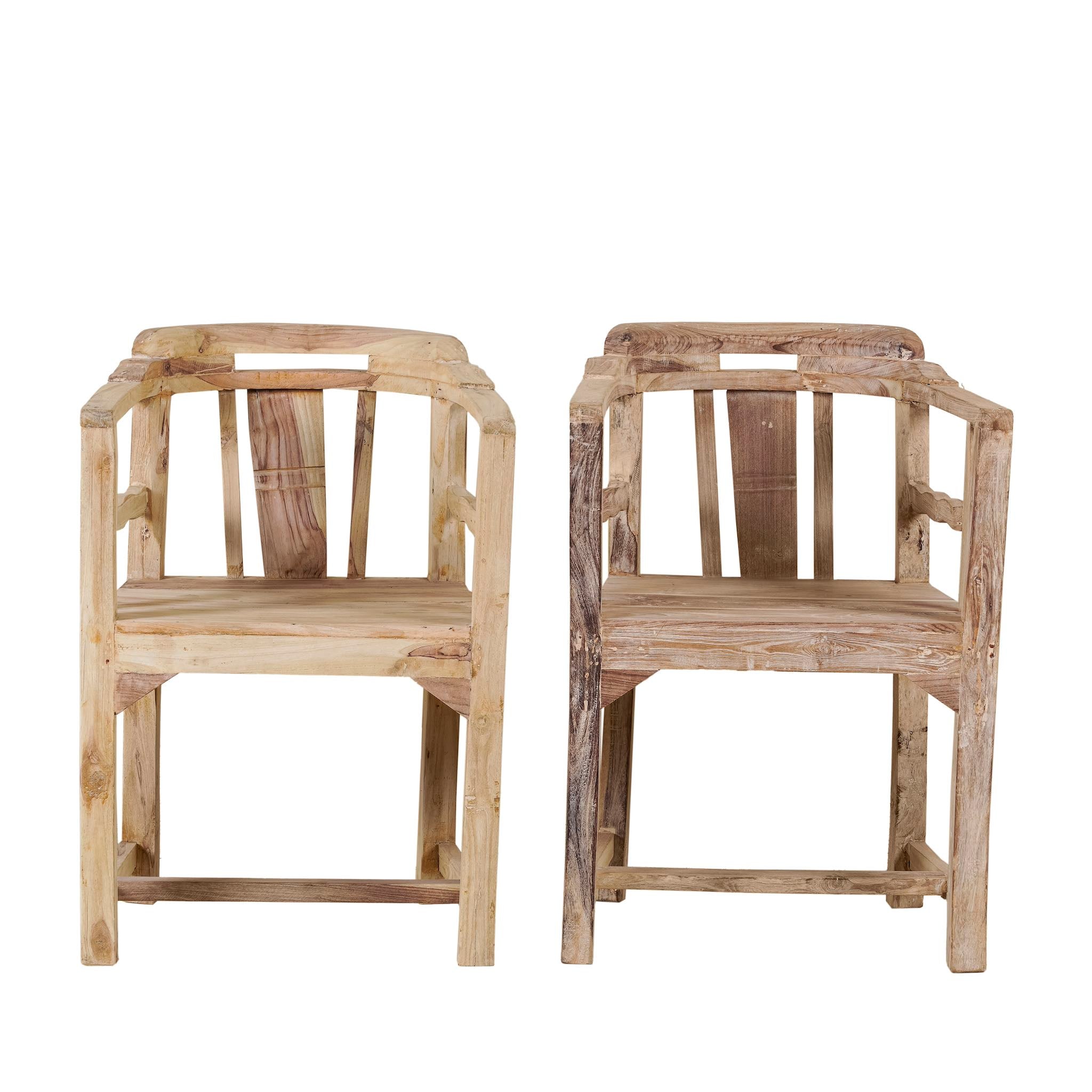 Front view image of a rustic-style armchair made from reclaimed teak wood, featuring a natural, unfinished look with visible wood grain and variations in tone, and a curved backrest with vertical slats.

