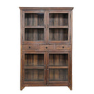 White background image of a refurbished antique teak wood showcase with four glass-panelled doors and two drawers – sustainable teak wood furniture combining timeless elegance and functional design.